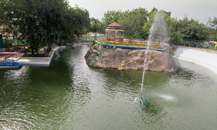 A recreational area developed at a former captive limestone mine in Dalmiapuram, Tamil Nadu.