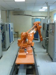 An ABB robot deals with all of the laboratory's incoming samples from around the plant. It takes the samples, transfers them to a lab-scale mill for grinding and then presses them into a tablet for analysis.