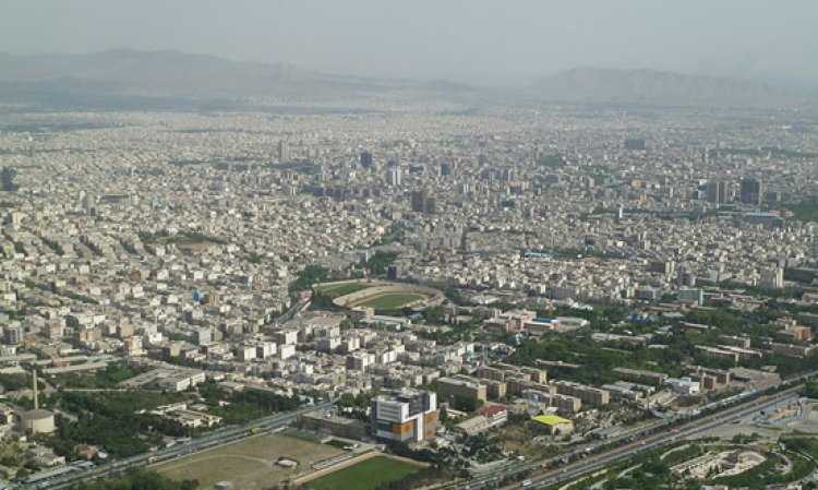 The skyline of Tehran,,the Iranian capital. Iran has a unique geographical location..As well as its seven land borders, it has access to the Persian Gulf, an extension of the Indian Ocean via the Gulf of Oman.