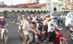 Busy traffic in downtown Ho Chi Minh City. The city  is Vietnam's second city but its most populous.
