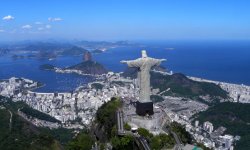 The statue of Christ the Redeemer, one of the first major constructions to be made from Brazilian cement, looks out over the city of Rio de Janeiro.