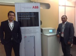 ABB staff in discussion with visitors to the company's stand.