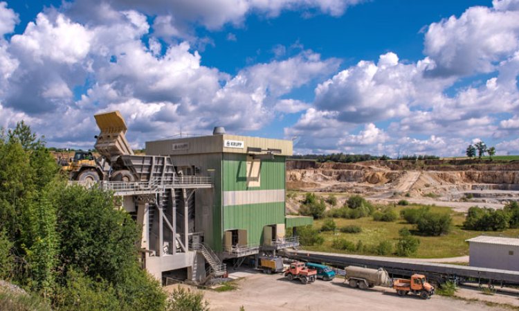 A load of blasted limestone is tipped into the ThyssenKrupp primary crusher by one of the plant’s three 90t haul trucks. Source: HeidelbergCement.