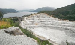 The limestone quarry with Kjopsvik, the Tysfjord and cement plant in the distance.