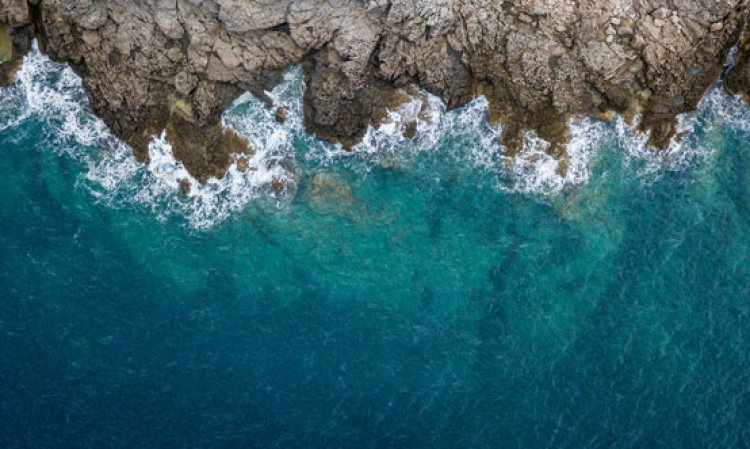 Aerial view of sea waves and rocky coast, Montenegro. Source: Shutterstock.