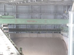 Views of the Bedeschi reclaimer in the plant's linear stockpile building. Its combined storage capacity is 44,000t of a mixture of limestone and clay.