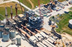 Scenes from the construction of the new kiln line (including views of the old wet kilns).