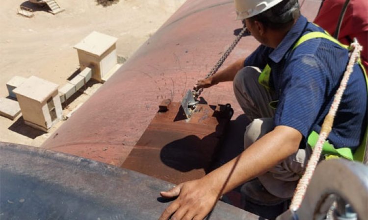 Work being carried out on the kiln at the El Nahda Cement plant during its 