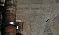 Section of the kiln and a worker at the Grupa Ozarow cement plant in Ozarow, Poland from the top of the preheater tower. Source: Robert Nadratowski, entrant to the Global Cement Photography Competition 2016.