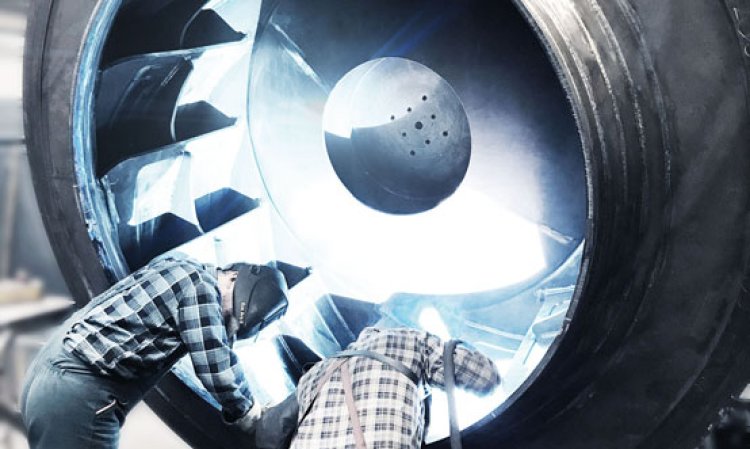 Welding impellers.