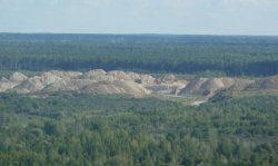 View of the Kalcitas-run limestone and clay quarry that supplies Akmenes Cementas.