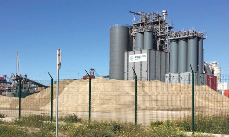 The Ecocem Dunkirk plant seen behind GGBS from the adjacent ArcelorMittal steel plant.