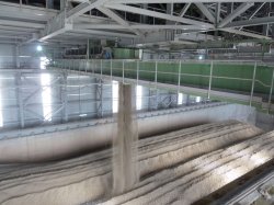 Views of the Bedeschi stacker in the plant's linear stockpile building. Its combined storage capacity is 44,000t of a mixture of limestone and clay.