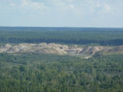 View of the Kalcitas-run limestone and clay quarry that supplies Akmenes Cementas. The separation of the companies that run the quarry and plant was a Soviet decision in the 1980s that was carried through during privatisation in the 1990s.