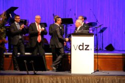 Stefan Wehning of HeidelbergCement receiving a health & safety award from VDZ President Gerhard Hirth.