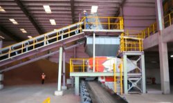 Figure 1: A Vecoplan VAZ 2000 MF T crusher fed by a belt conveyor form part of the DG Khan alternative fuel system at Chakwal.