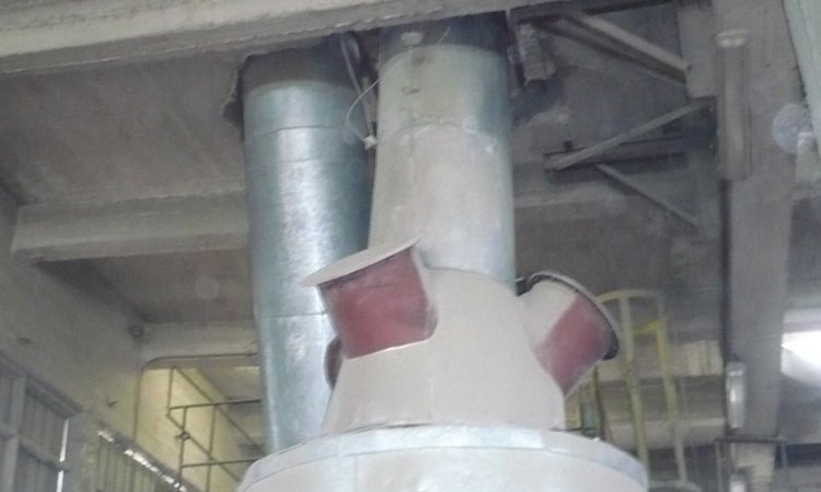 A cyclone of an indirect firing coal mill system that hardly could have been laid out worse. The cyclone has been installed inside a building, which disallows protection by means of explosion venting. Equipping it with explosion vents has been aborted, as evidenced by the blind covers that have been installed in place of explosion vents. The explosion pressure shock resistance will be very low, if present at all.