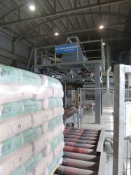 A Beumer palletiser stacks and wraps the bags for dispatch.