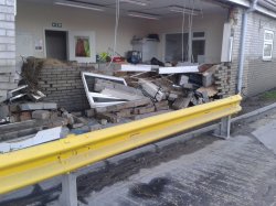 Photos of the aftermath of the flood. Such was the force of the incoming water that walls were destroyed and cement silo trucks left the ground.