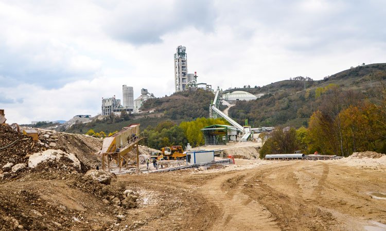 View of the crusher and preheater tower from the edge of the plant’s 250Mt limestone quarry.