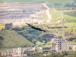 A Lancaster Bomber flies over the Hope Construction Materials cement plant on 16 May 2013 marking the 70th anniversary of the 'Dambuster' raids. Source: Stephen Elliott, Hope Construction Materials. www.stephenelliottphotograpy.co.uk.