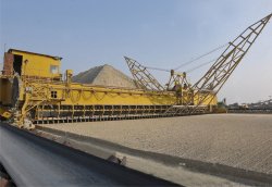 The plant's stacker-reclaimer for raw materials.