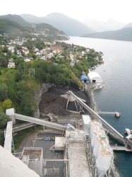 The view from the top of the preheater tower shows just how close the Norcem Kjopsvik plant is to the village.
