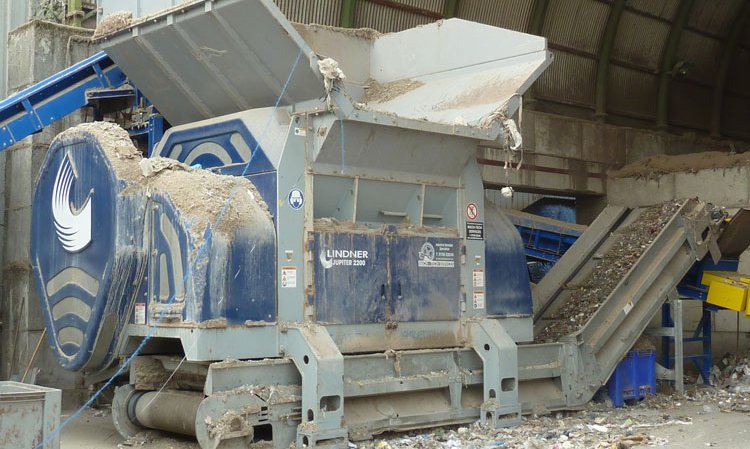 …as coarse material is shredded in a Lindner shredder.